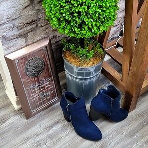 Like new Women Navy leather suede like ankle boots by Carlos Santana...